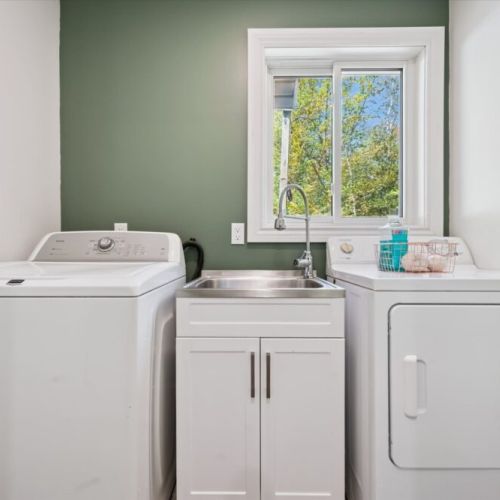 Convenient in-cottage laundry with full-size washer and dryer—perfect for longer stays and family vacations.