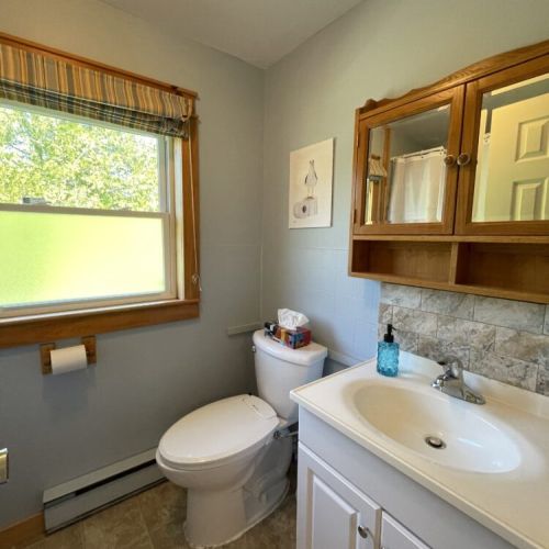 Clean and bright main bathroom with everything you need