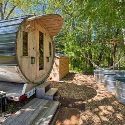Unwind in the wood-fired barrel sauna after a day exploring the Bruce Peninsula.
