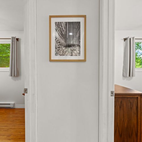 Bright, open spaces create a welcoming cottage atmosphere.