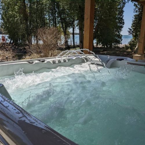 Enjoy a relaxing soak as you watch the sunset from DeLana's high-end hot tub. Let the power jets massage your back as you forget about life for. awhile.
