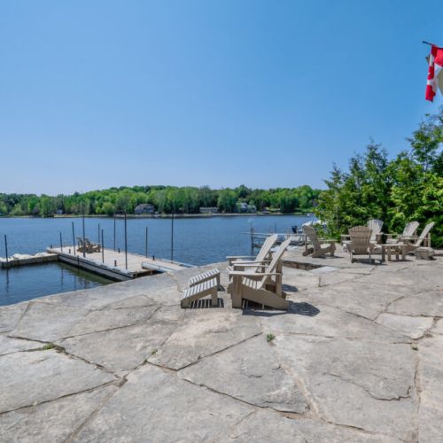 Expansive waterfront patio with plenty of seating to take in the bay views.