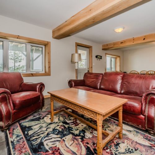Enjoy quality time with family and friends in this spacious living room, perfect for lounging and creating lasting memories.