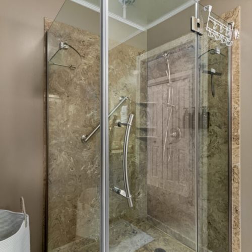 Refresh after a day of exploring in this spacious glass-enclosed shower.
