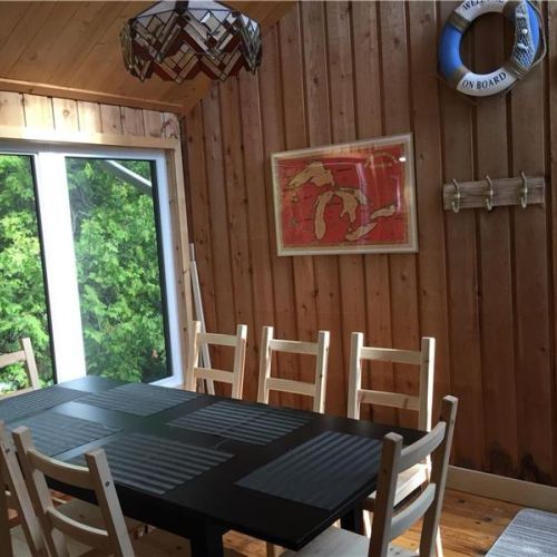 Bright dining area with plenty of seating for shared meals and family gatherings.