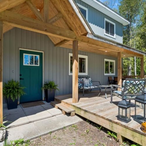 Enjoy your morning coffee or evening conversation on the covered front porch surrounded by nature.