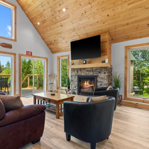 Relax by the cozy stone fireplace after a day exploring the Bruce Peninsula.