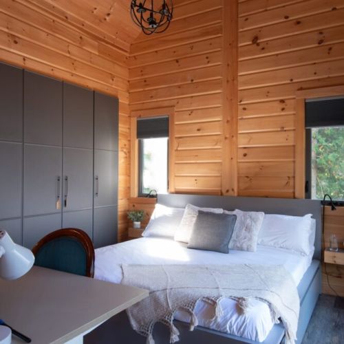 Main floor Bedroom with ensuite: 
King bed with 3pc ensuite stand up shower. 
Bedroom 1 of 3