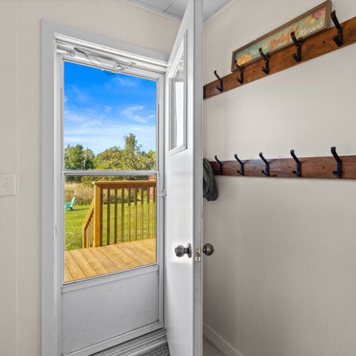 Step directly outside to the deck and spacious yard, perfect for enjoying the fresh country air.