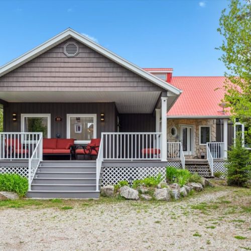 A luxurious, all-season retreat designed for multi-generational families, dual-family vacations, or groups of friends. This home blends comfort, style, and lakefront serenity into one unforgettable destination.