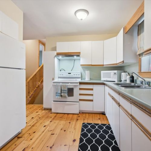 A charming kitchen space with plenty of counter space for prepping meals