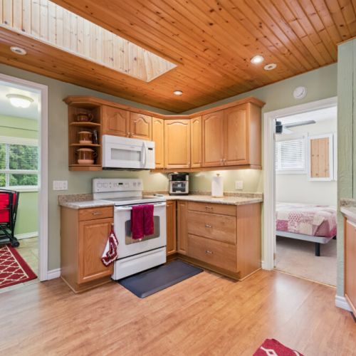 Fully equipped kitchen with plenty of counter space, perfect for cooking meals and snacks during your stay.