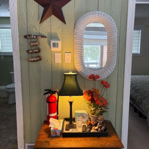 Handy entry table with cottage essentials and a welcoming touch as you settle in.