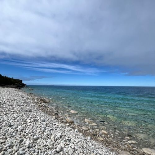 Stroll along the pristine shoreline and dip into turquoise waters—ideal for beach lovers and nature seekers alike.