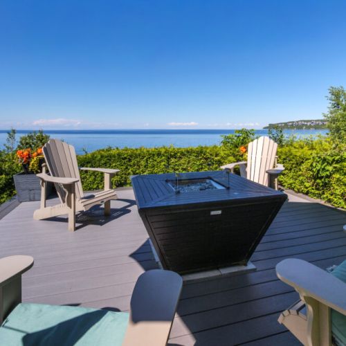 Gather around the fire table on the upper deck while taking in panoramic views of Georgian Bay.