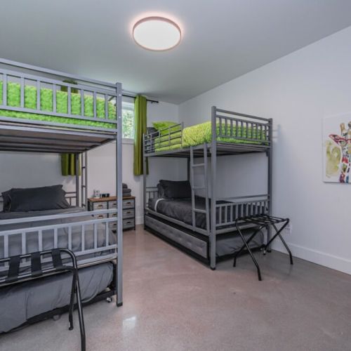 Lime-Green kids room with matching bunk beds.