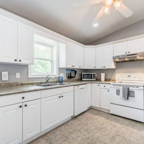 With ample counterspace and a dishwasher, preparing meals and cleaning up after is easy.