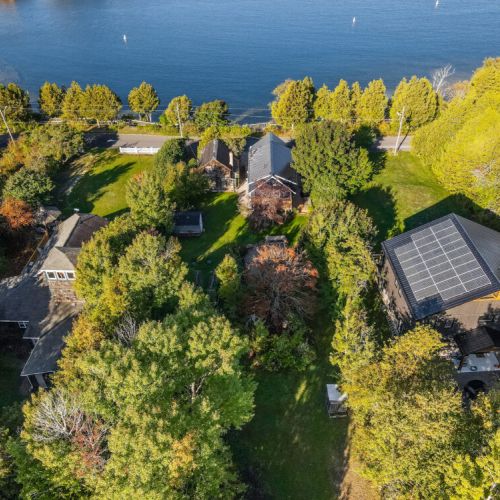 Discover the serene waterfront just steps away from the property, offering picturesque views and tranquil moments by the water.