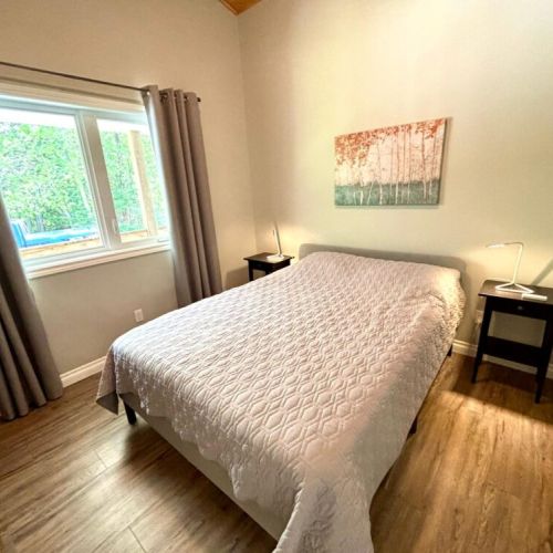 Clean, cozy, and filled with light—this bedroom is all about laid-back comfort.