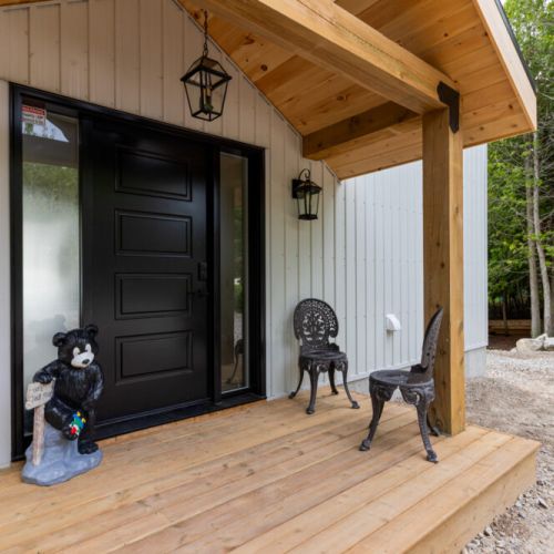 Relax on the covered front porch with your morning coffee or evening drink.
