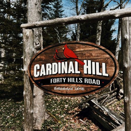 Welcome to Cardinal Hill — where the red cardinals greet you at sunrise. Tucked among the trees, this tranquil woodland escape begins right at the gate.