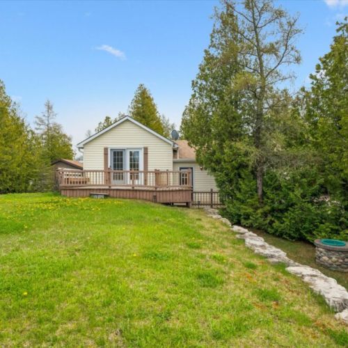 Enjoy a generous grassy yard with space for family games, outdoor activities, and relaxing afternoons.
