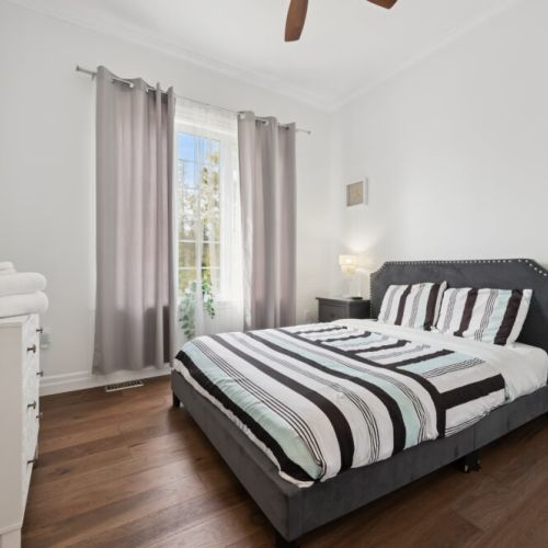 Bedroom 1: Cozy bedroom with queen bed, perfect for restful nights after a day outdoors
