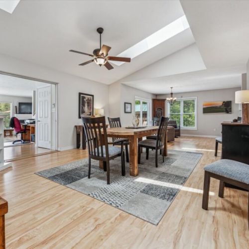 Spacious and inviting, the open-concept dining area seamlessly connects to the living space — perfect for gathering everyone together.