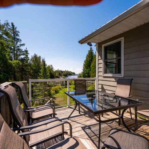 Enjoy a barbeque meal on the upper deck patio furniture.