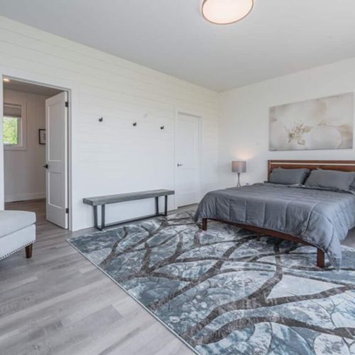 The Queen's stateroom with a spectacular walk-in closet, lounge, ensuite and incredible view of Lake Huron,