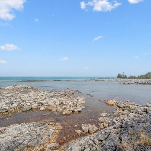 Crystal-clear water and rocky shoreline—great for swimming and exploring.