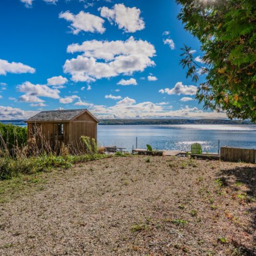 Sit back in Adirondack chairs by the firepit, soaking up the scenic beauty of Georgian Bay with its sparkling waters just a few steps away.