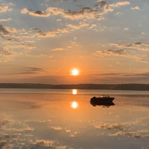 Wake up to golden sunrises mirrored on calm waters—ideal for peaceful mornings and picture-perfect lake vacations.