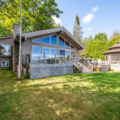 The spacious backyard is great for fun and games.