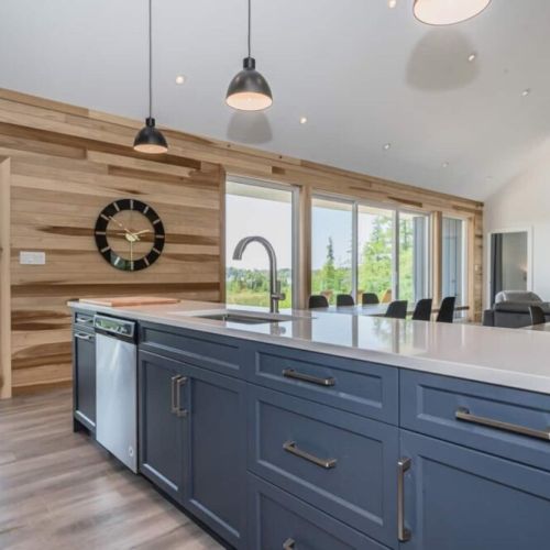 The fully equipped kitchen comes fully stocked with two servant's rooms behind it for catering large functions.