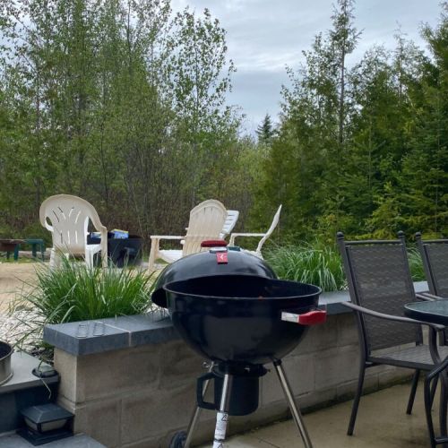 Guests are welcome to bring their own charcoal and enjoy the outdoor bonfire pit and hot tub, both conveniently accessible from the basement level. Basement level access is for 2 nights or more.