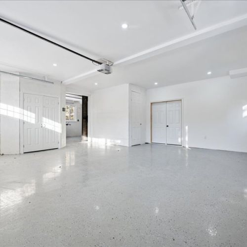 Massive heated garage space with bright lighting and a clean, finished feel. Great for extra storage, gear, hobbies, or longer-stay convenience.