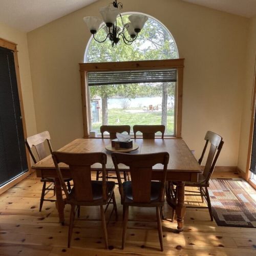 Sun-filled dining space with peaceful views of the outdoors