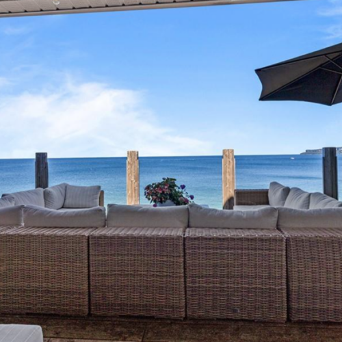 Enjoy your morning coffee or host a sunset dinner with friends on the expansive deck. With glass railings providing unobstructed views of Georgian Bay, it's a perfect spot to unwind.