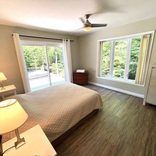 Wake up to natural light and step right out to the back patio and hot tub—your own private retreat.