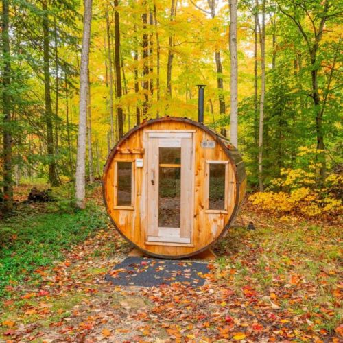 Melt away stress in the wood-fired barrel sauna, nestled in a peaceful forest setting—perfect for a private detox or après-hike unwind.