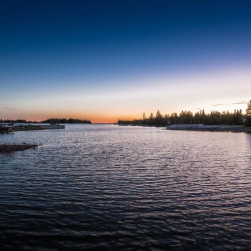 Calm waters and unforgettable sunsets await just steps from the cottage.
