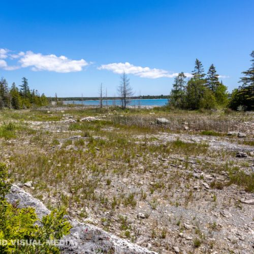 Rugged, natural shoreline and wide-open sky—classic Bruce Peninsula scenery.