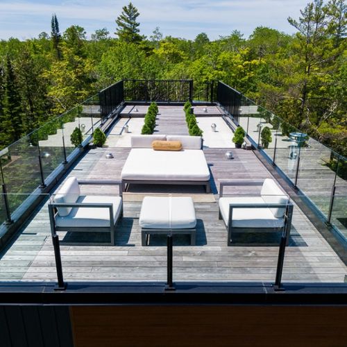 Plush outdoor seating creates the perfect setting for golden hour views, quiet evenings above the treeline, and nights under brilliantly clear Dark Sky stars.