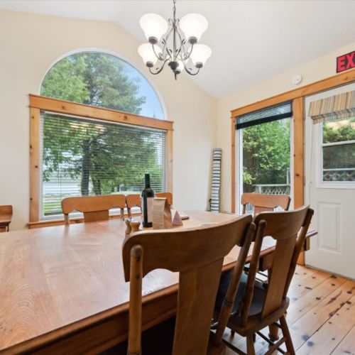 Sun-filled dining space with peaceful views of the outdoors