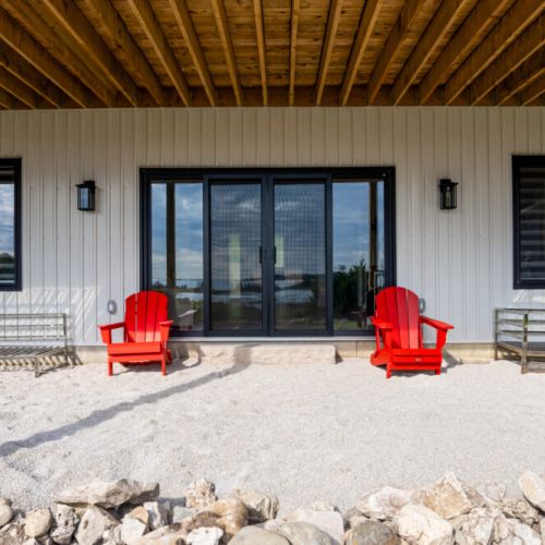 Step outside and enjoy the waterfront from the covered lower patio.