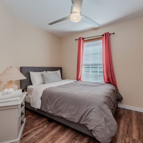 The second bedroom provides a cozy and inviting space, perfect for additional guests or family members to relax and recharge.