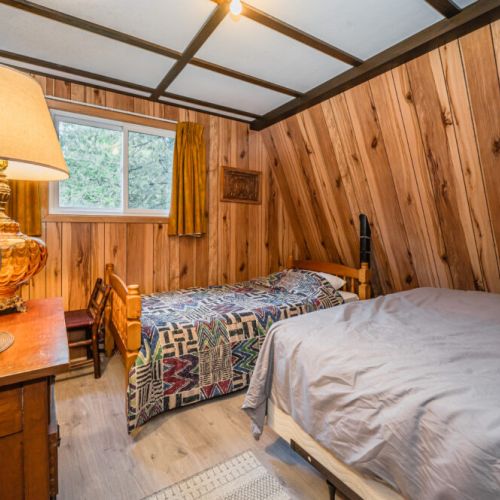 Warm lighting to accent the natural light from outside, and dresser to store clothing.