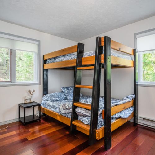 Bunk bed room is perfect for restful slumbers and mornings greeted by the gentle sounds of the bay.