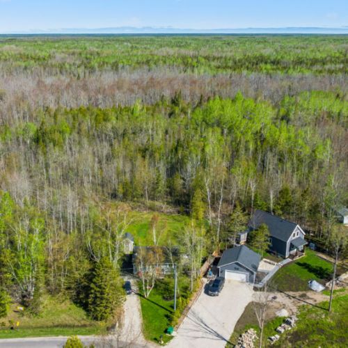 An aerial perspective of your next getaway. Trade the traffic for a sea of trees and a deep breath of fresh cottage air.